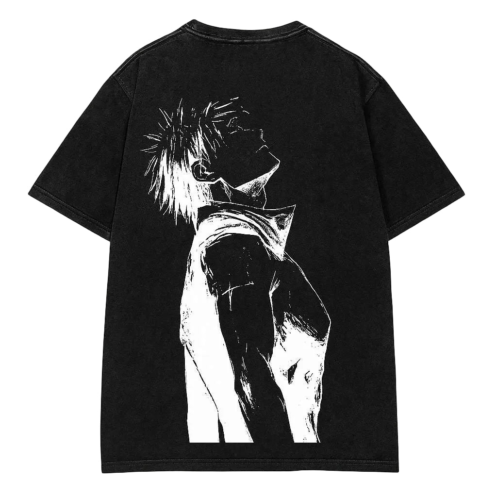 A black short-sleeve t-shirt laid flat on a light gray wood-textured background, featuring a large white graphic print of an anime-style character on the back.