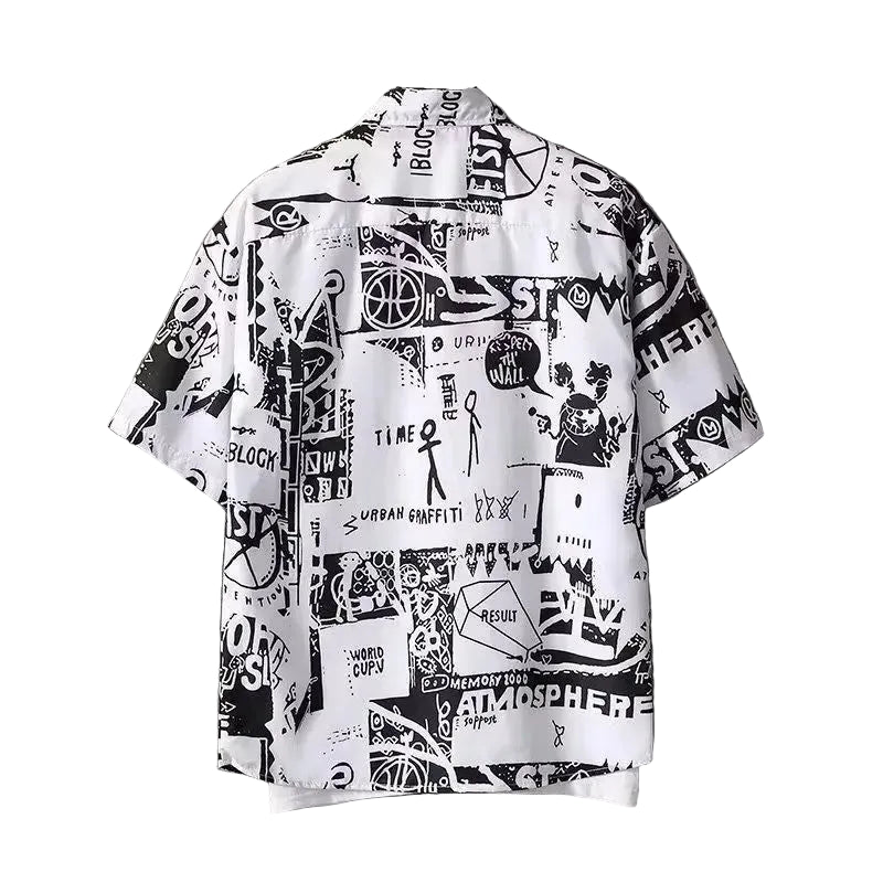 White shirt with black graphic designs on a textured gray background