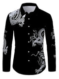 Black shirt with white dragon designs on a wooden background