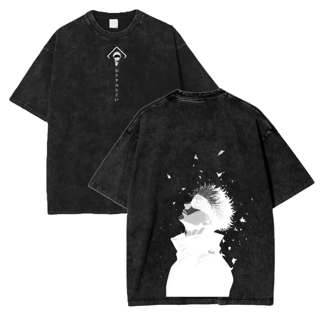 Black t-shirt with white graphic design on a wooden surface