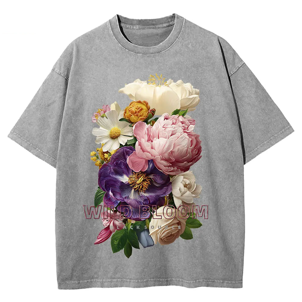 Gray t-shirt with colorful floral design on a white background