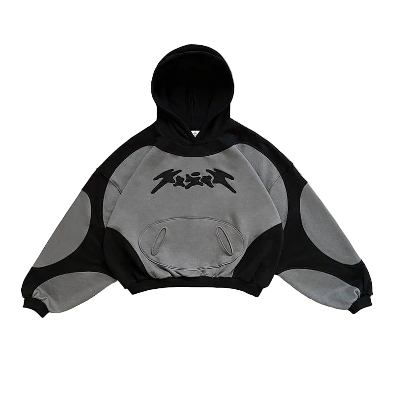 Black and gray hoodie with a logo on a textured surface