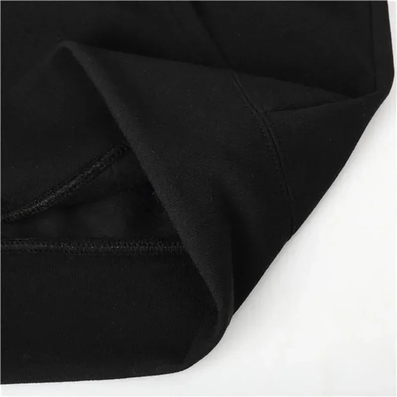 Close-up of a black fabric texture on a white background