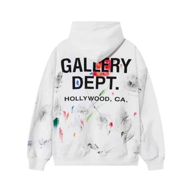 White hoodie with 'GALLERY DEPT.' text and colorful abstract design on a white background