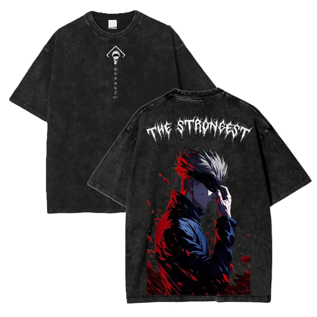 Black t-shirt with graphic design and text 'The Strongest' on a wooden surface