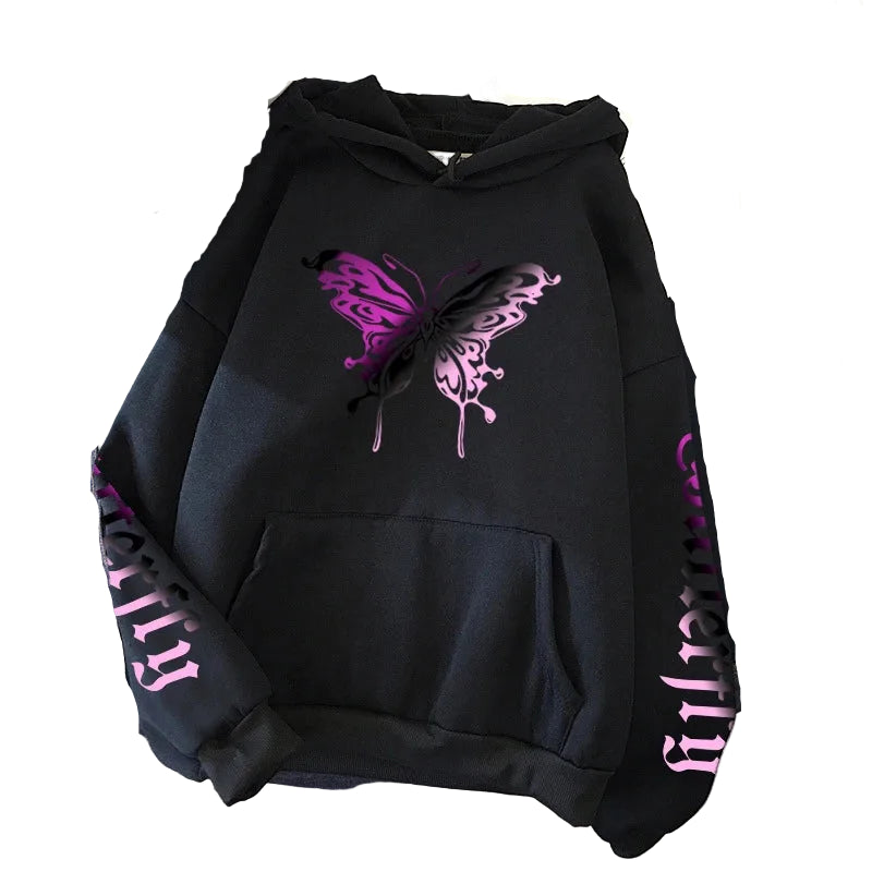 Black hoodie with pink butterfly design on a gray surface